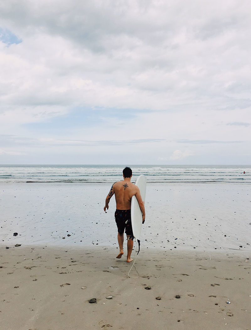 surfer at santa teresa beach